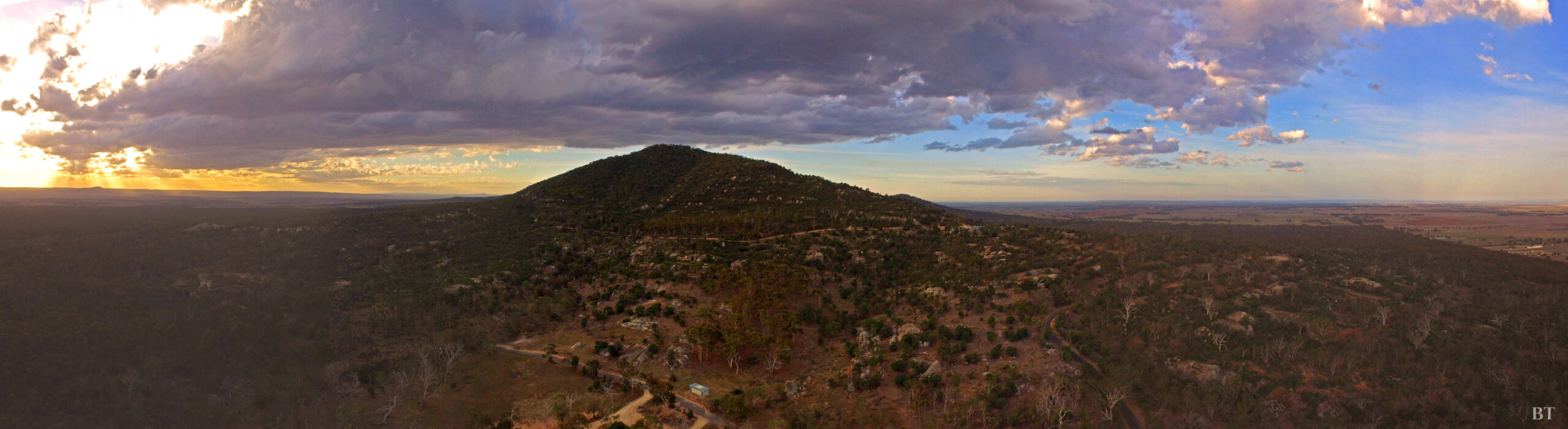 You Yangs — ancient granite peaks at sunset, visible from Melbourne's western growth corridor